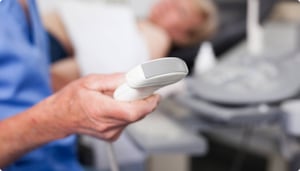 Hand holding ultrasound probe